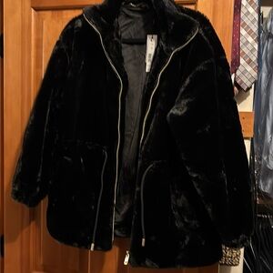 Brand new faux fur jacket with tags.